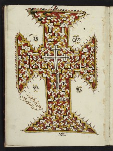 Buchschmuck in Form eines Kreuzes
