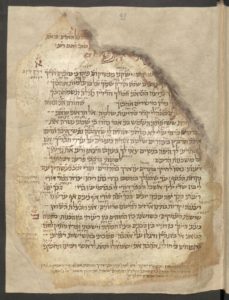 Folio 63r des Kodizes mit Text in hebräischer Schrift, versehen mit Randbemerkungen